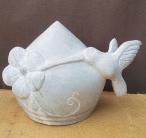 sculpture pierre oiseau mouche